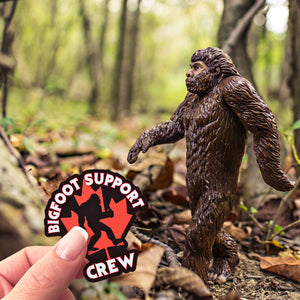 A Bigfoot Support Crew magnet being held in front of Bigfoot!