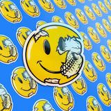 A pile of happy face stickers.