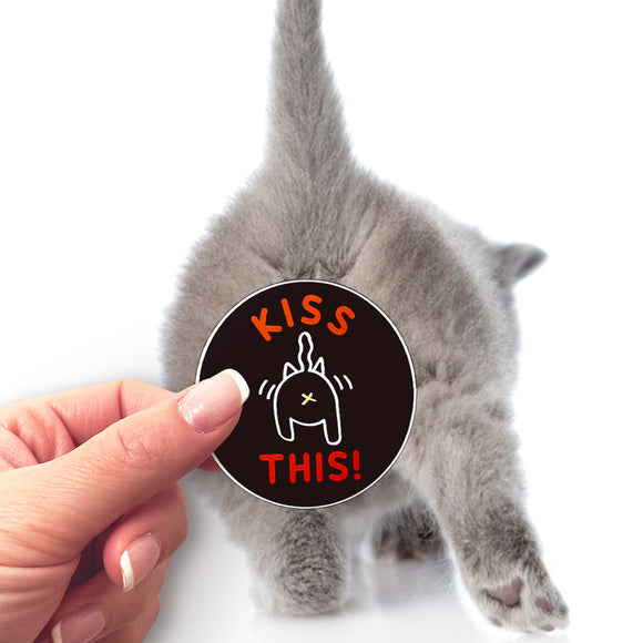 A Kiss This sticker behind a fuzzy cat's butt!