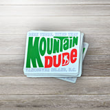 A pile of "Mountain Dude Been There, Hiked That Vancouver Island, B.C." stickers. 