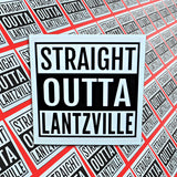 This is a bunch of rows of Straight Outta Lantzville stickers. 